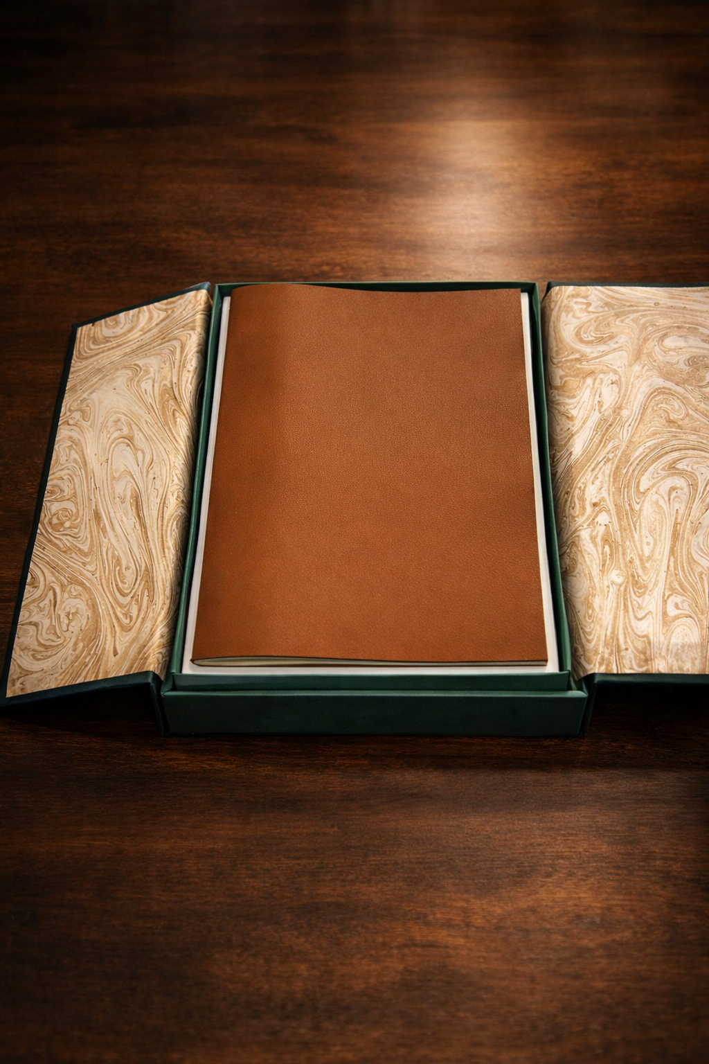 Leonardo da Vinci Codex on the Flight of Birds facsimile edition displayed inside green leather presentation case with marbled paper interior
