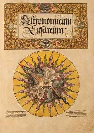 Astronomicum Caesareum Renaissance astronomy title page with dragon volvelle chart.